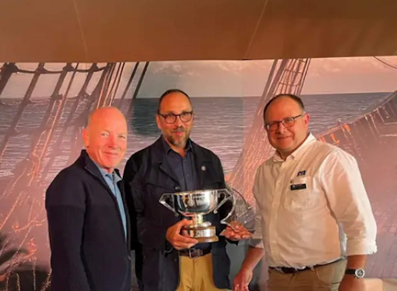 Tom Stierle presented with prestigious award by Mike Golding OBE.png