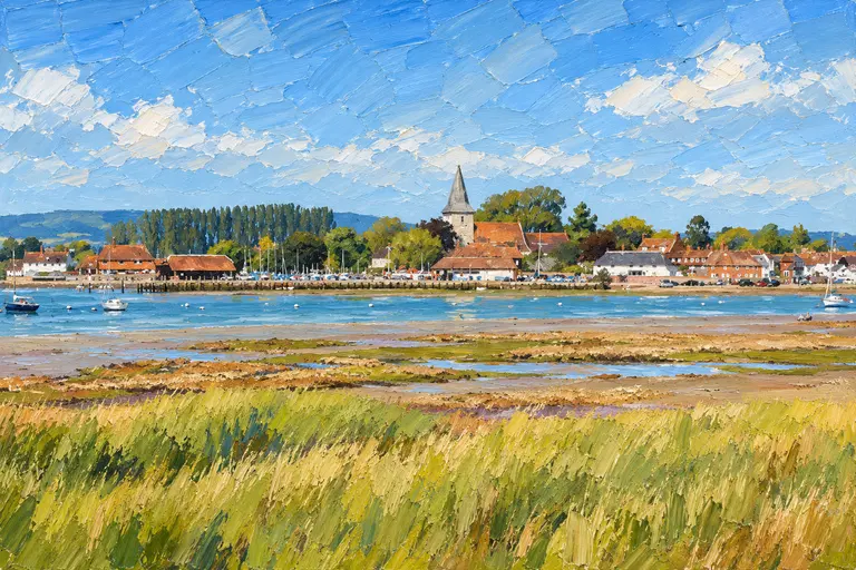 Chichester Harbour viewed across its tidal waters and shoreline